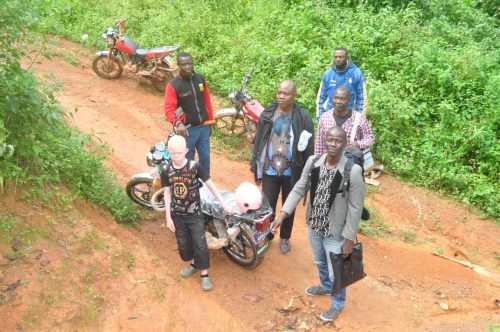 MW-volunteers-arriving-in-a-village-in-rural-Cameroon-to-distribute-school-supplies